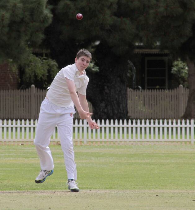 Michael Perry bowling earlier this season. He had a good day with the bat on the weekend.