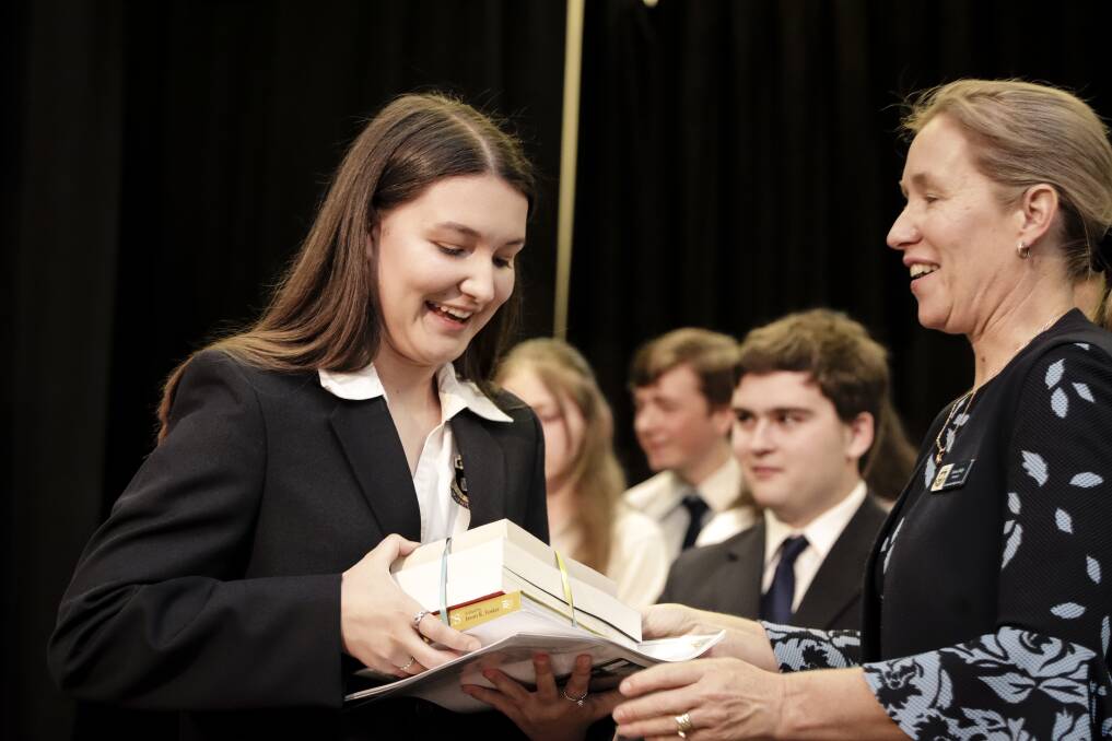 Brianna Hefren at the annual presentation evening receiving her awards from
Principal Leesa Daly