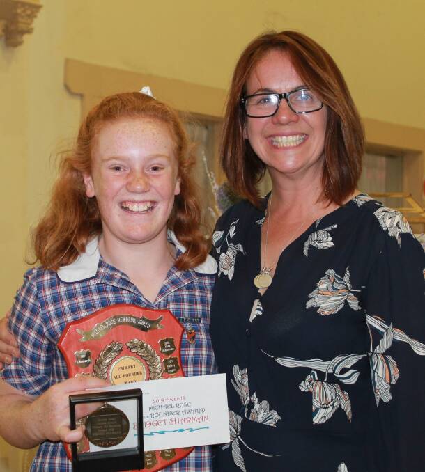 Sacred Heart student Bridget Sharman, winner of the Michael Rose All Rounder award, with Principal Nicky Trinder. 