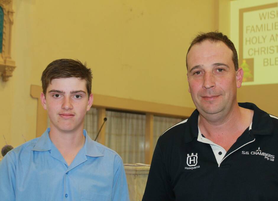 Michael Perry, winner of the S G Chambers Dux award, with Jason Chambers.