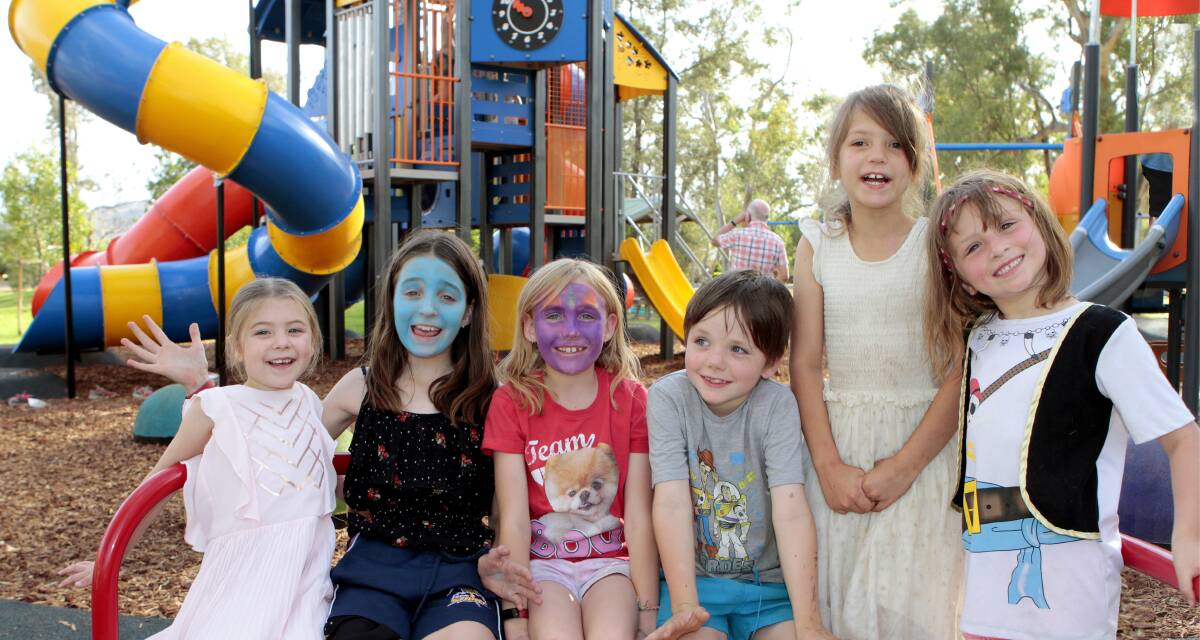 The new play equipment at Jubilee Park was a big hit for the kids at Carols In The Park - Coota kids Catalina Carter-Pahulu, Esther Ray, Ella Ray, Tyler Billsborrow (Tyler was also celebrating his birthday) Ava and Charlotte Billsborrow.