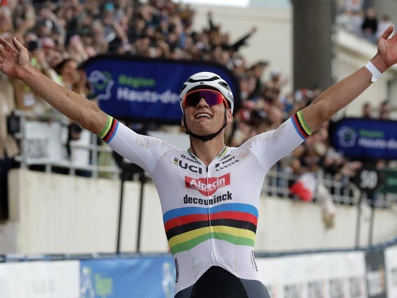 Mathieu van der Poel hails his second straight Paris-Roubaix triumph after a wonderful solo ride. (EPA PHOTO)